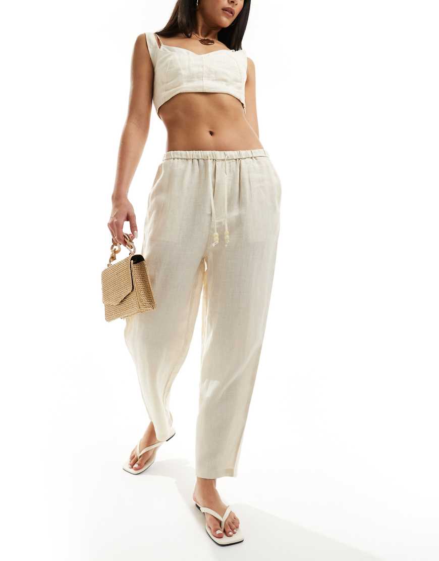Mango - Leinenhose in Weiß mit Tunnelzug in der Taille Mango - Leinenhose in Weiß mit Tunnelzug in der Taille von Mango