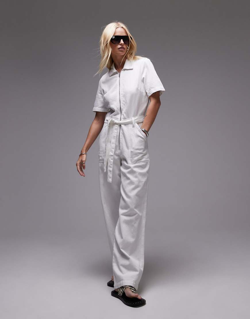 Mango - Locker geschnittener Jeans-Jumpsuit in Weiß mit durchgehendem Reißverschluss von Mango