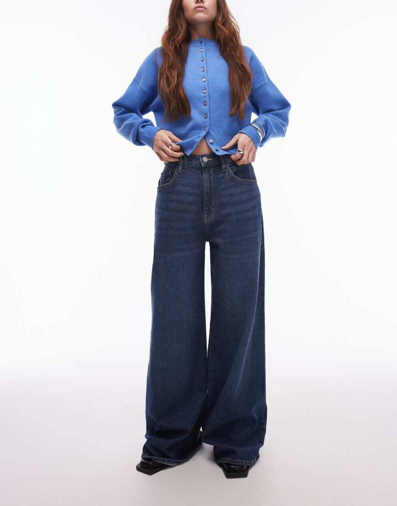 Mango - Elise - Longline-Jeans in Mittelblau mit weitem Bein von Mango