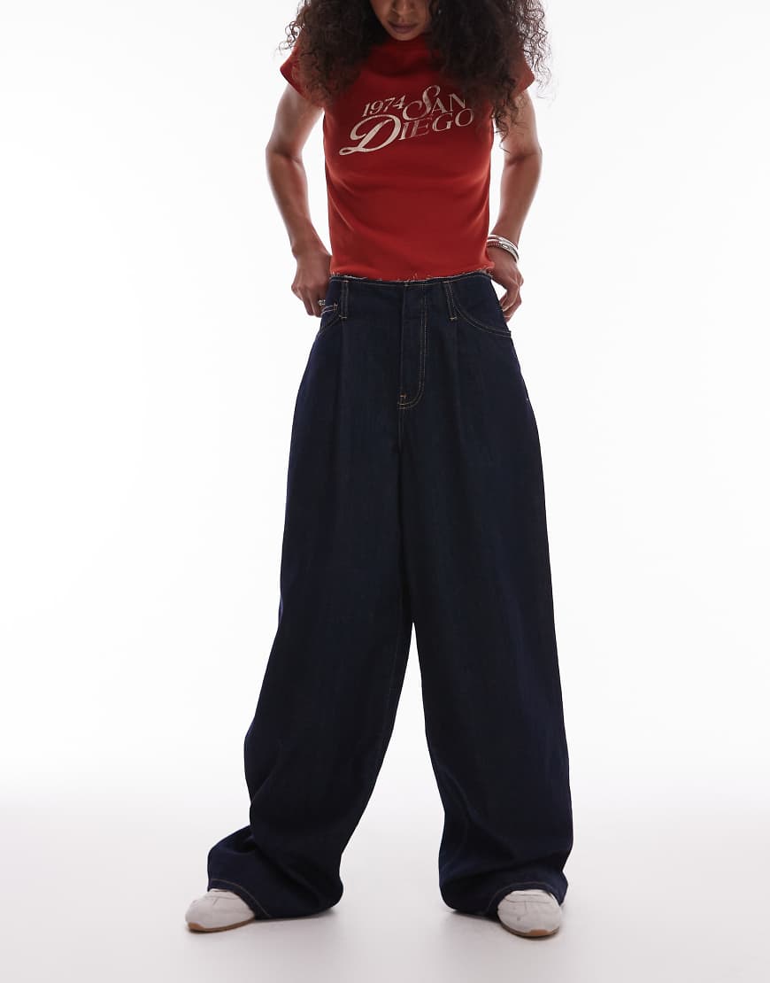Mango - Maddy - Jeans in Dunkelblau mit ungesäumtem, niedrigem Bund Mango - Maddy - Jeans in Dunkelblau mit ungesäumtem, niedrigem Bund von Mango