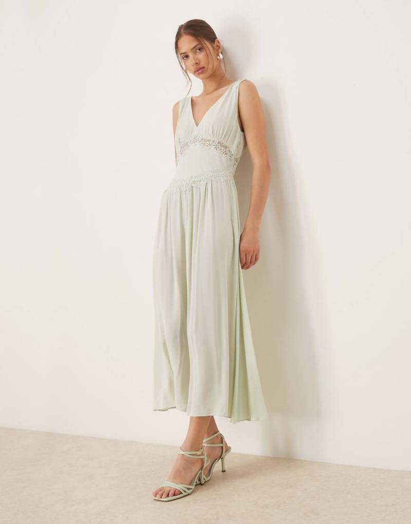 Mango - Midikleid in Blassgrün mit Spitzendetail und V-Ausschnitt von Mango