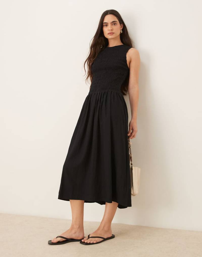 Mango - Midikleid in Schwarz mit tief sitzender Taille und gesmoktem Oberteil von Mango