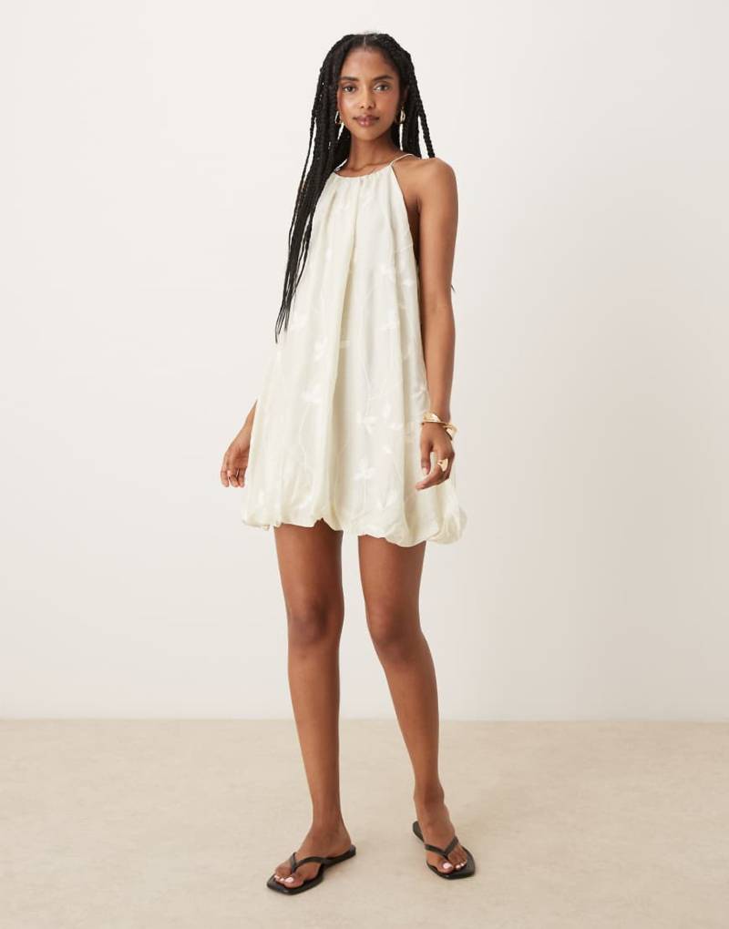 Mango - Neckholder-Kleid in Cremeweiß mit Ballonsaum und Blumenstickerei-Neutral von Mango