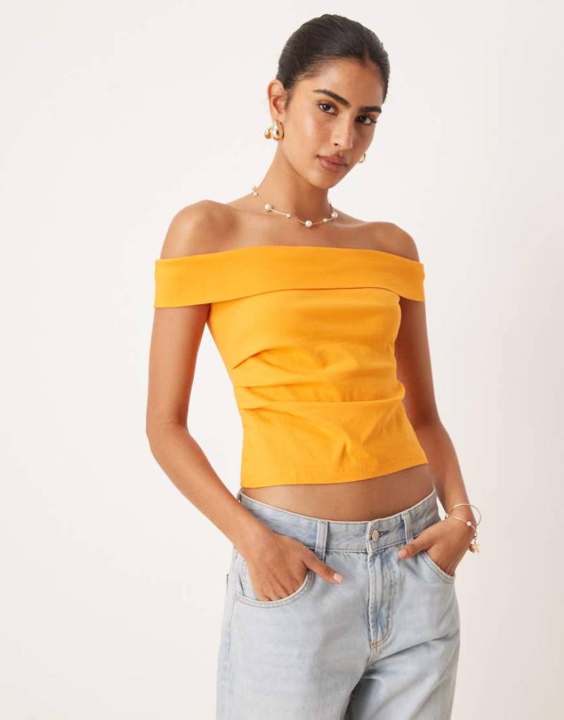 Mango - Oberteil in Orange mit Carmen-Ausschnitt Mango - Oberteil in Orange mit Carmen-Ausschnitt von Mango