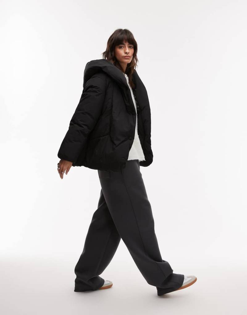 Mango - Oversize-Puffermantel in Schwarz mit lockerem Schnitt und Kragen von Mango
