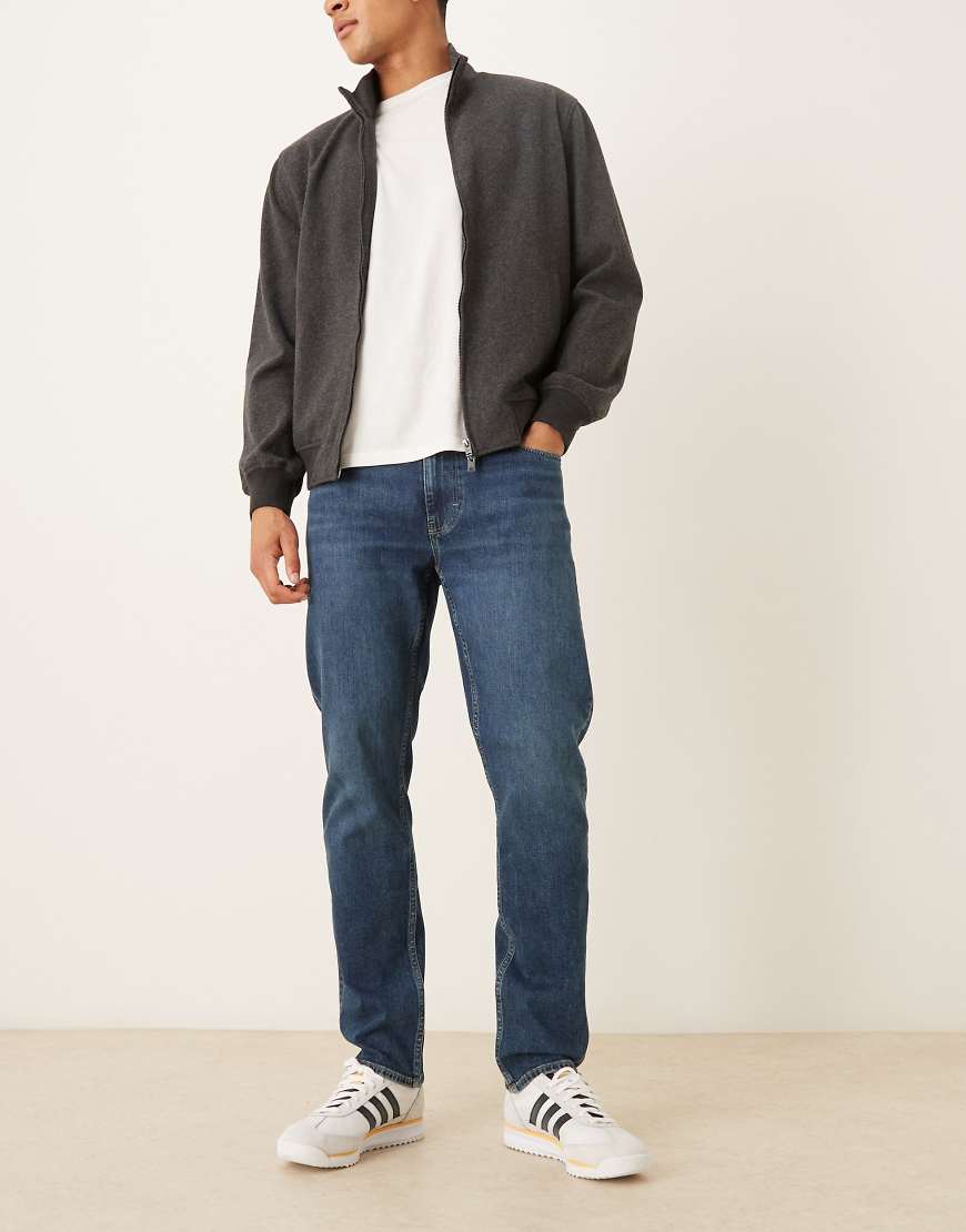 Mango - Patrick - Slim-Fit-Jeans mit hohem Baumwollanteil in Dunkelblau von Mango