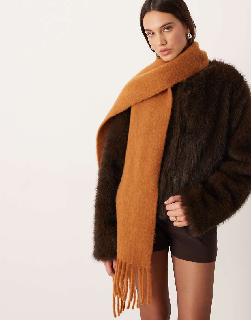 Mango - Schal aus Wollmix in Orange mit Fransen Mango - Schal aus Wollmix in Orange mit Fransen von Mango