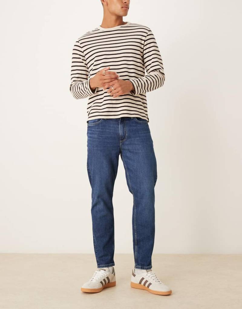 Mango - Schmal zulaufende Jeans in Dunkelblau von Mango