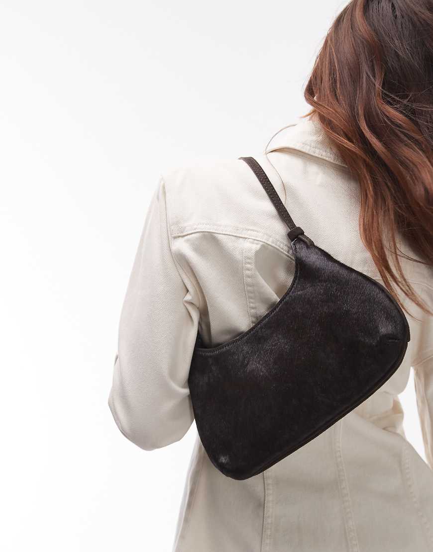 Mango - Schultertasche aus Ponyfell in Dunkelbraun Mango - Schultertasche aus Ponyfell in Dunkelbraun von Mango