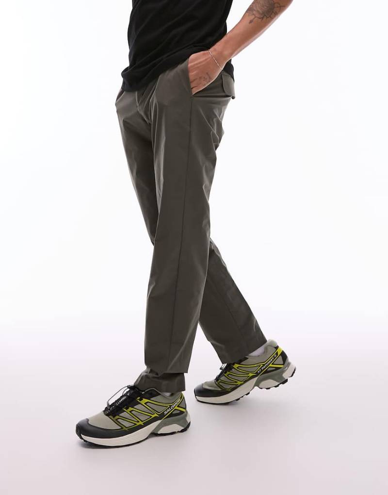 Mango - Slim-Fit-Hose aus atmungsaktivem Performance-Material in Hellgrün von Mango