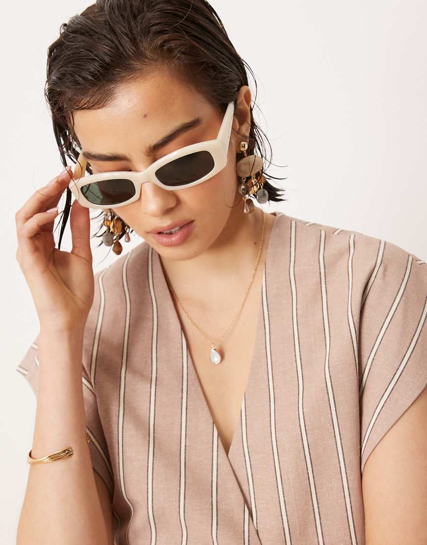 Mango - Sonnenbrille mit rechteckigem Gestell in Cremeweiß-Neutral Mango - Sonnenbrille mit rechteckigem Gestell in Cremeweiß-Neutral von Mango