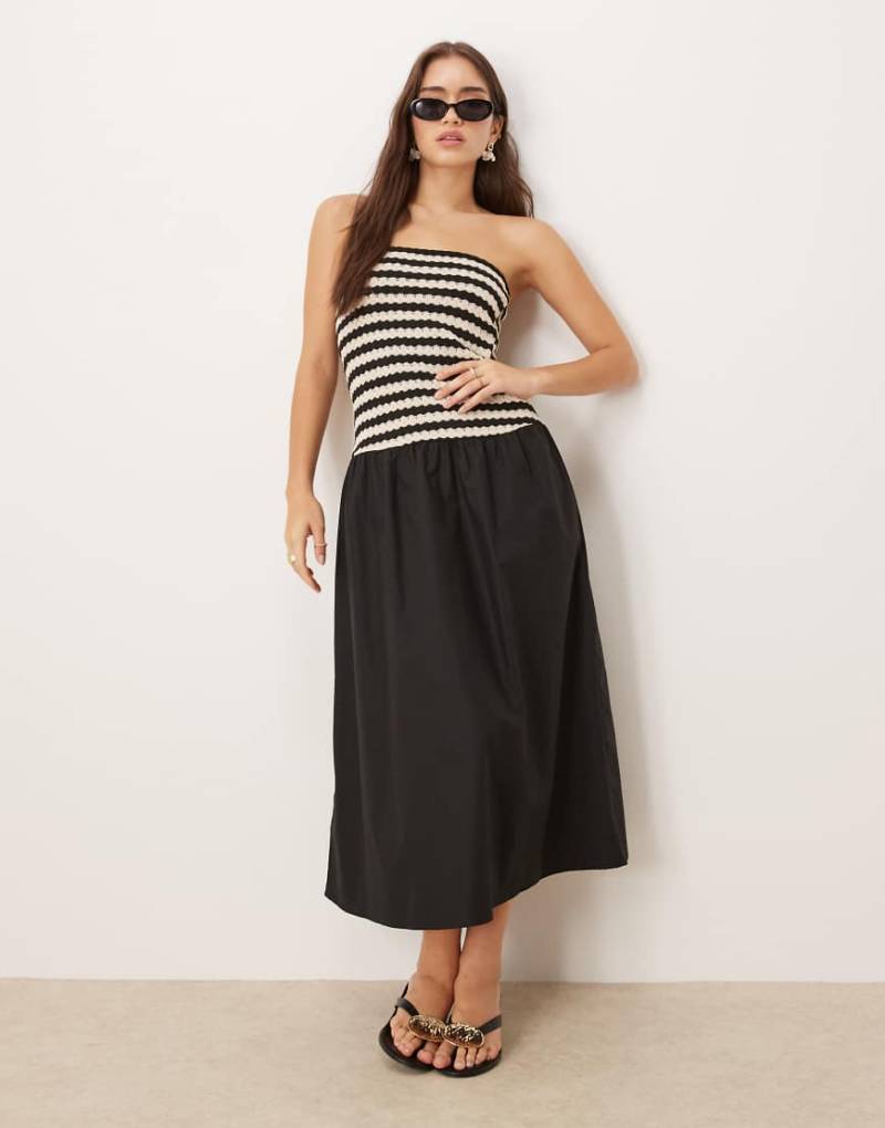 Mango - Wadenlanges Kleid aus Baumwolle in Schwarz mit gestreiftem Oberteil mit Häkel-Design von Mango