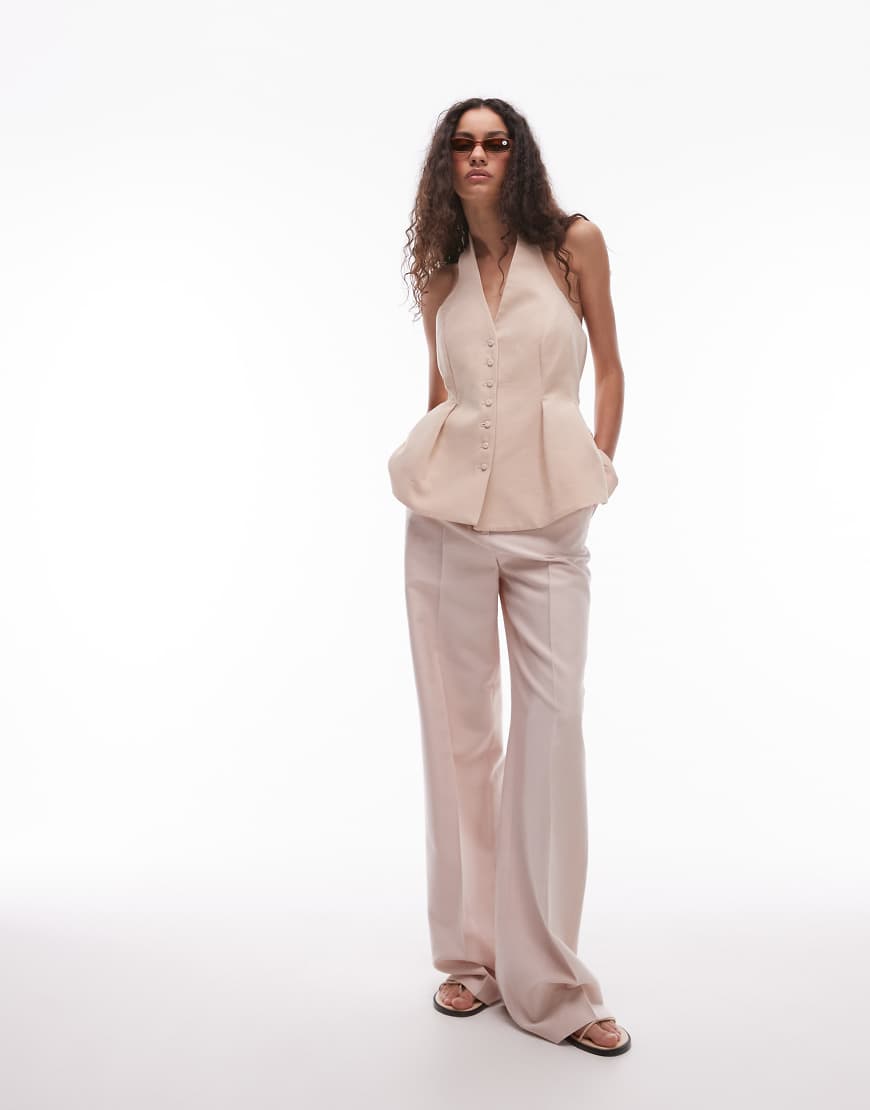 Mango - Weit geschnittene Hose in Blassrosa mit Nahtdetails vorne, Kombiteil Mango - Weit geschnittene Hose in Blassrosa mit Nahtdetails vorne, Kombiteil von Mango