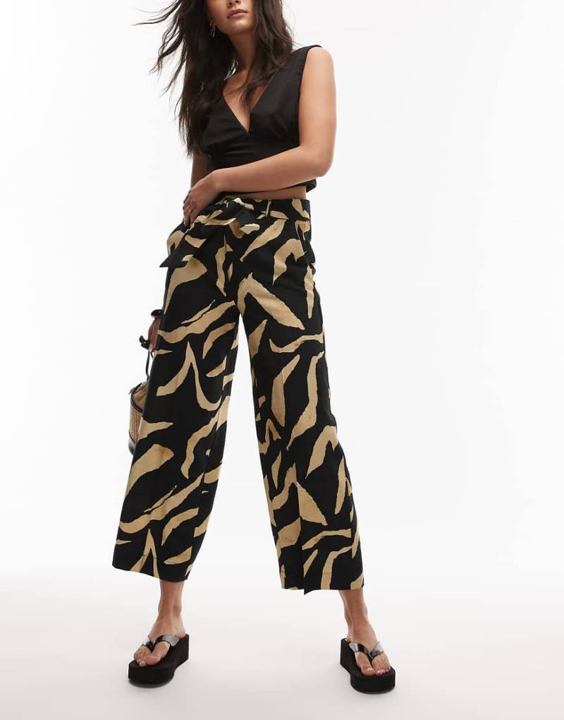 Mango - Weit geschnittene Hose in Schwarz mit abstraktem Muster von Mango
