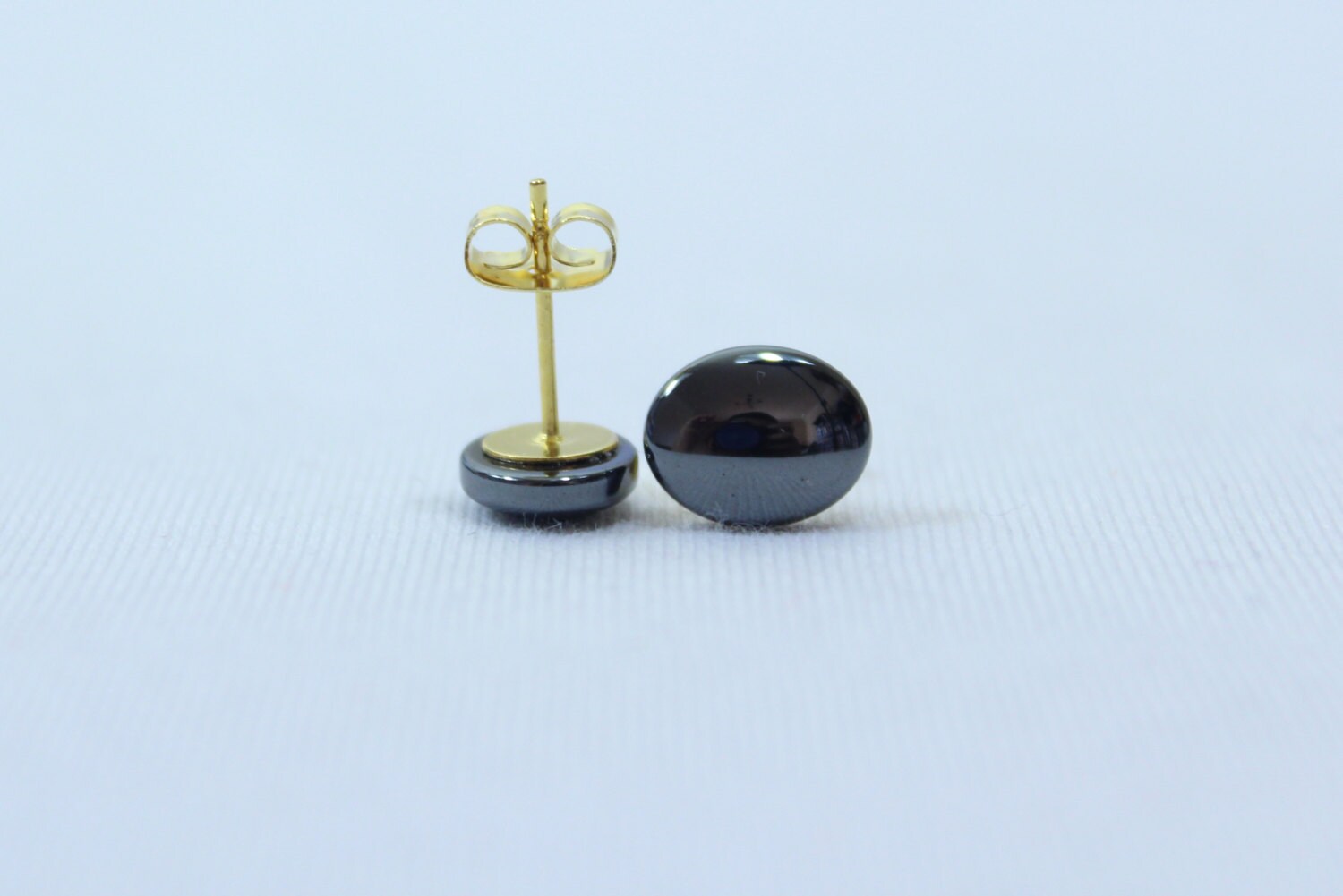 10mm X 8mm Hämatit Ohrstecker Oval Ohrringe Cabochon Mapenzigems 10mm X 8mm Hämatit Ohrstecker Oval Ohrringe Cabochon Mapenzigems von MapenziGems