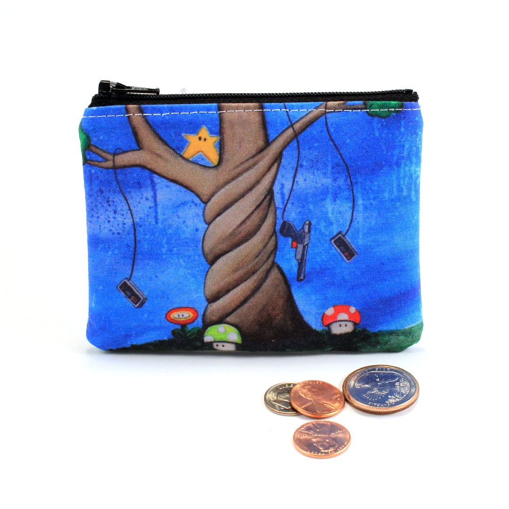 The Tree Of Extra Life - Kleines Kosmetiktäschchen Nintendo Mit Pilzen, Duck Hunt Controller, Invincability Star Illustration Von Marcia Furman von MarciaFurman