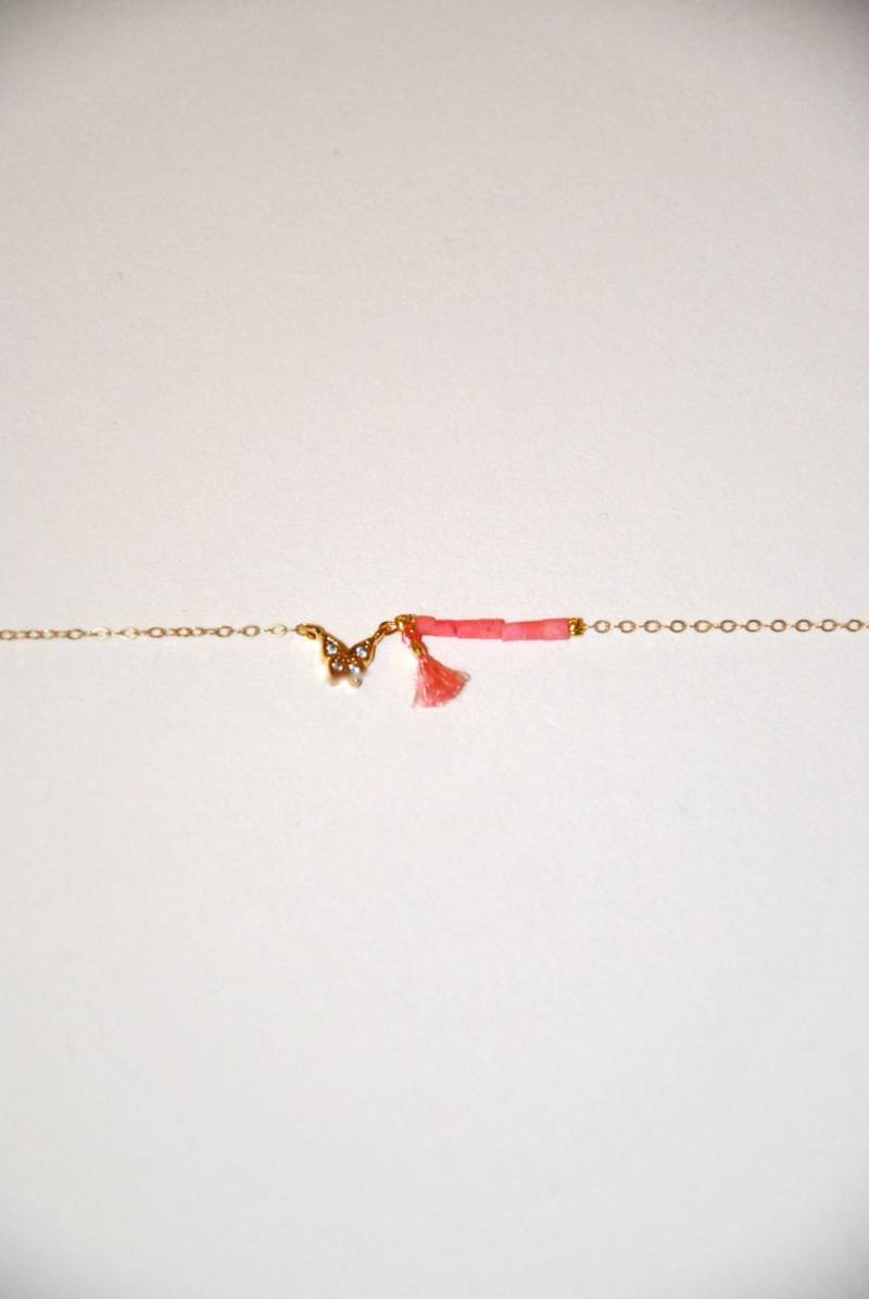 Vintage Armband Sehr Fein Vergoldet Mit Rosa Steinen Und Kleinen Schmetterling von MarieSubirana