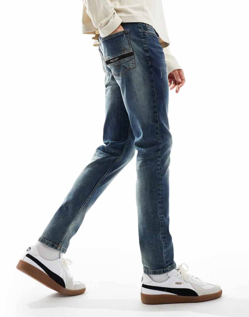 Marshall Artist - Jeans mit engem Schnitt in Vintage-Waschung-Blau von Marshall Artist