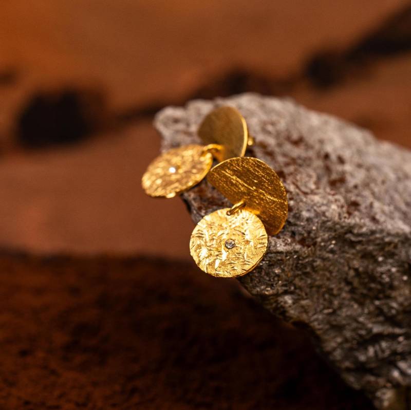 Goldene Sternohrringe von Martegioielli