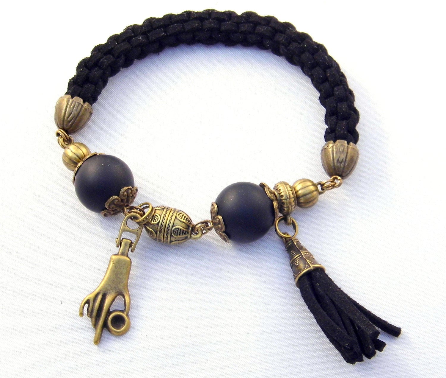 Boho Armband Faux Wildleder Seil Paracord Geflochten Geflochtene Hand Hippie Indie Black Schungit Quaste Bettelarmband Boho Armband Faux Wildleder Seil Paracord Geflochten Geflochtene Hand Hippie Indie Black Schungit Quaste Bettelarmband von Martinia