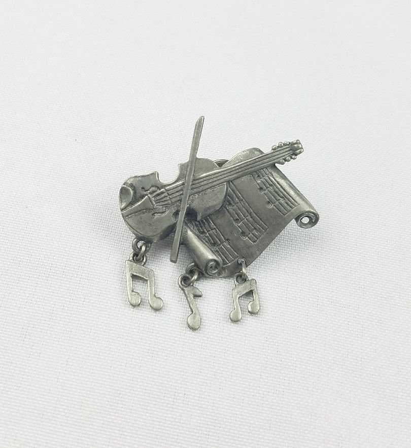 Vintage Lcd-Brosche Silber-Ton-Musik Noten Chello Charme Vintage Lcd-Brosche Silber-Ton-Musik Noten Chello Charme von MashliDesign