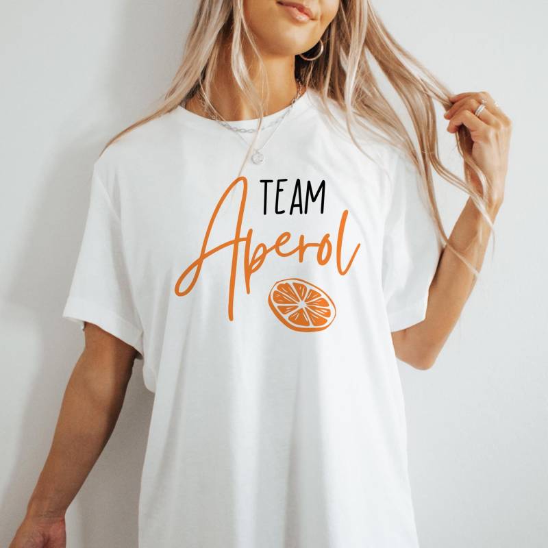 Team Aperol T-Shirt - Der Perfekte Begleiter Für Spritz Liebhaber von MeinLieblingsteilDE