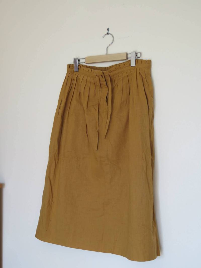 Vintage-Rock Cacharel Paris Beige Wool Skirt 1980 Halblang Wolle Baumwolle Mit Poket-Taschen Vintage-Rock Cacharel Paris Beige Wool Skirt 1980 Halblang Wolle Baumwolle Mit Poket-Taschen von Melangedecouleurs
