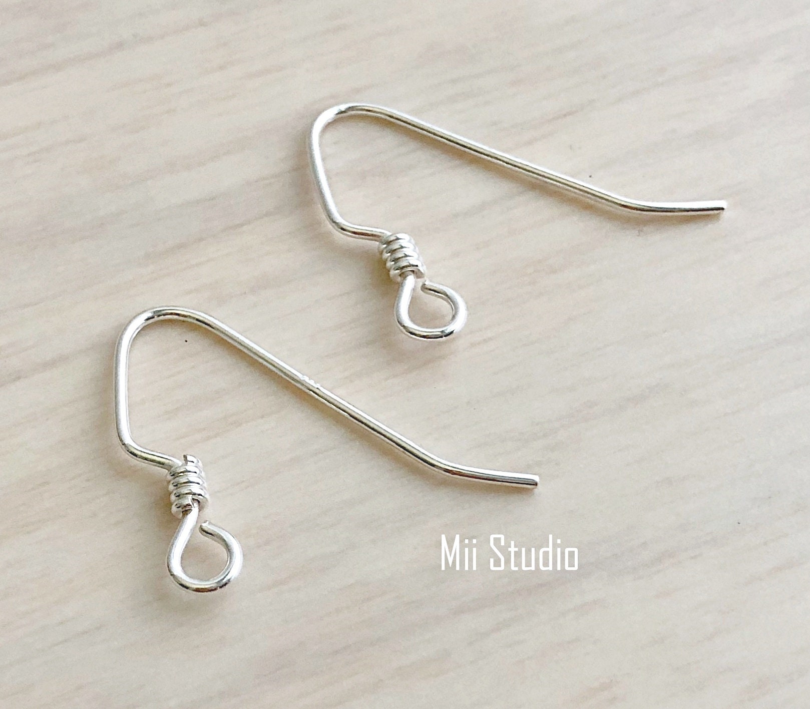 10 Stück Sterling Silber Ohrhaken Mit Spule, E75S 10 Stück Sterling Silber Ohrhaken Mit Spule, E75S von MiiStudio