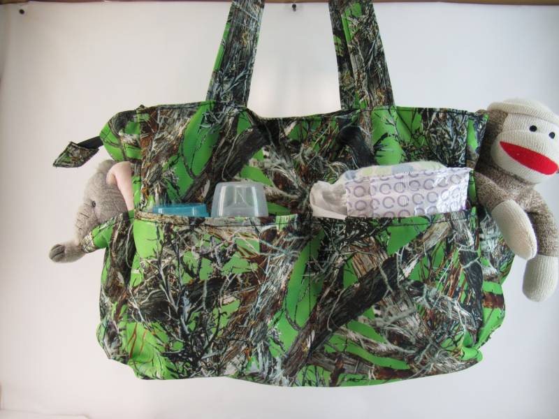 Limette Green Camo Diaper Bag Limette Green Camo Diaper Bag von MinachMitts