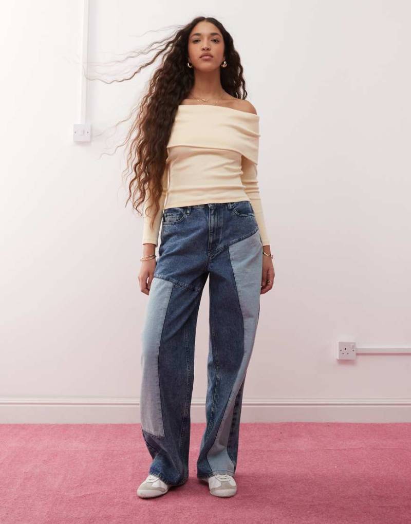 Miss Selfridge - Baggy-Jeans aus Denim in blauer Waschung mit Aufnähern von Miss Selfridge