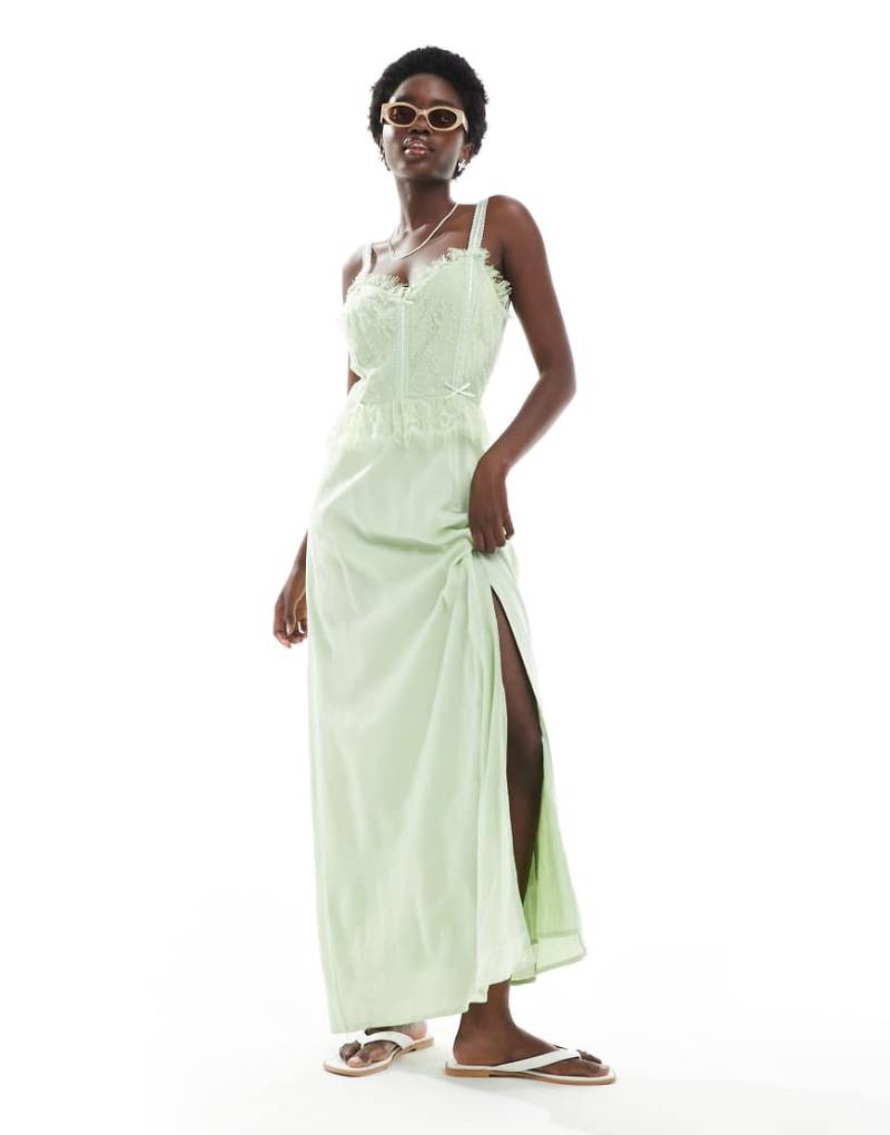 Miss Selfridge - Korsett-Maxikleid aus grob gewebter Baumwolle in Grün mit Schleifenbesatz von Miss Selfridge