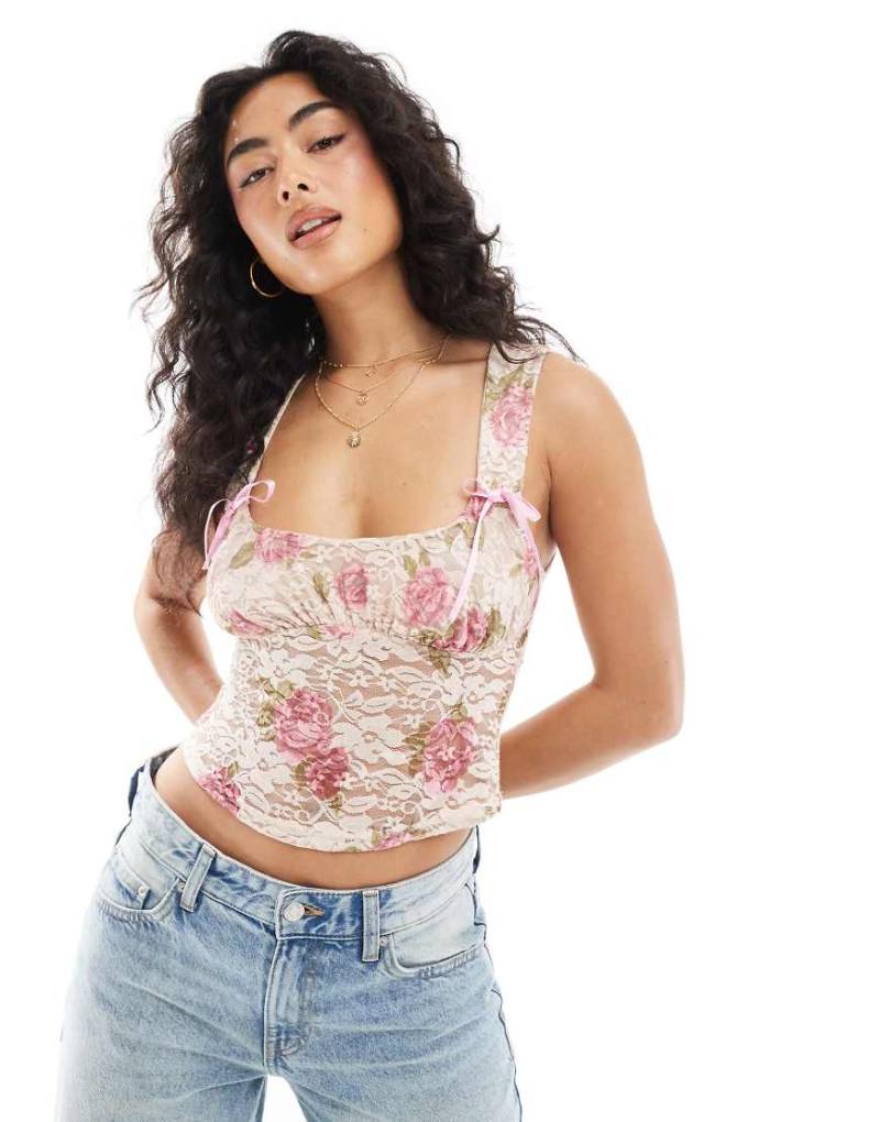 Miss Selfridge - Korsett-Oberteil in Rosa mit Spitzen-Zierschleife und Blumenmuster Miss Selfridge - Korsett-Oberteil in Rosa mit Spitzen-Zierschleife und Blumenmuster von Miss Selfridge