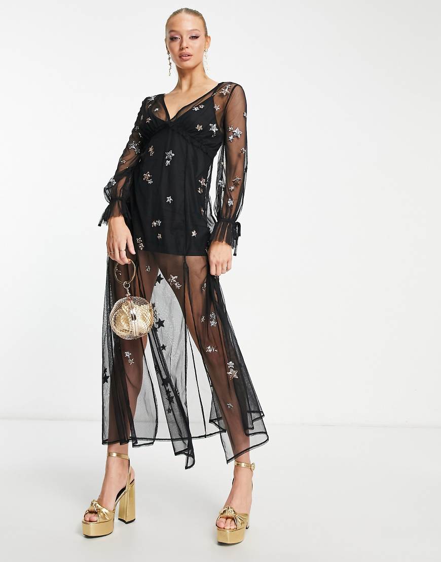 Miss Selfridge - Maxikleid in Schwarz aus transparentem Netzstoff mit Pailletten-Sternen von Miss Selfridge