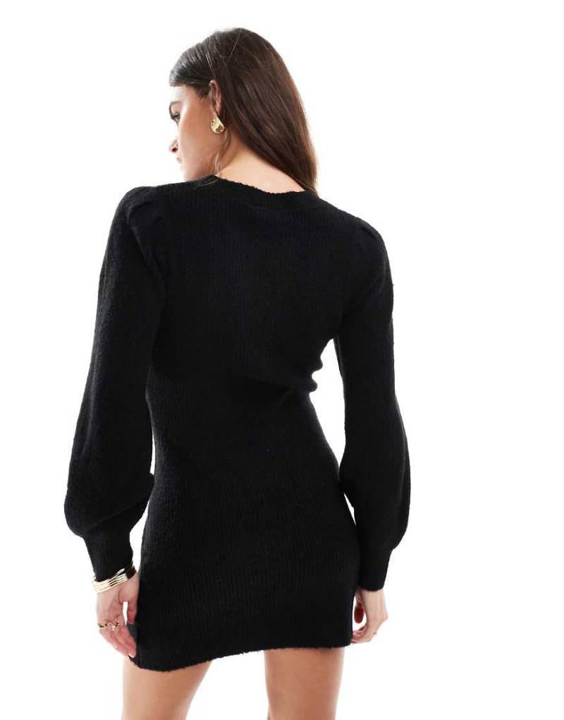 Miss Selfridge - Mini-Strickkleid in Schwarz mit Puffärmeln und Rundhalsausschnitt von Miss Selfridge