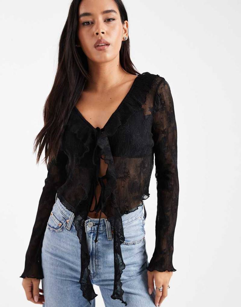 Miss Selfridge - Oberteil aus Spitze in Schwarz mit Bindebändern vorne Miss Selfridge - Oberteil aus Spitze in Schwarz mit Bindebändern vorne von Miss Selfridge