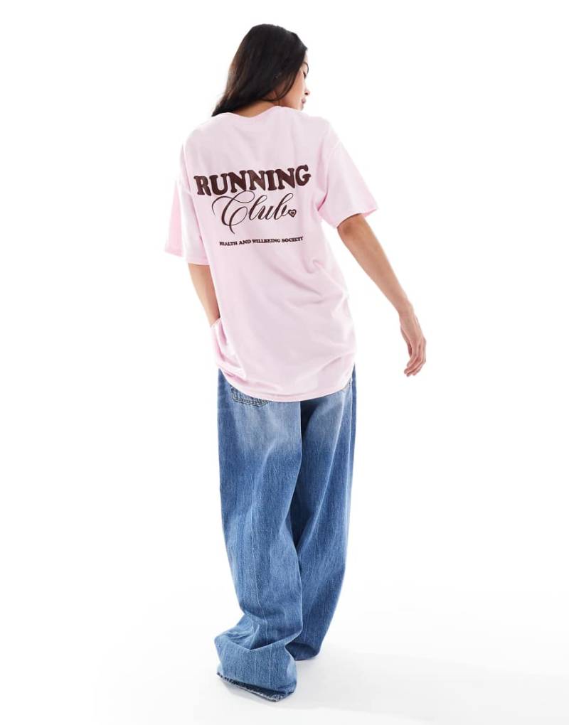 Miss Selfridge - Oversize-T-Shirt in Rosa mit „Running Club"-Print von Miss Selfridge