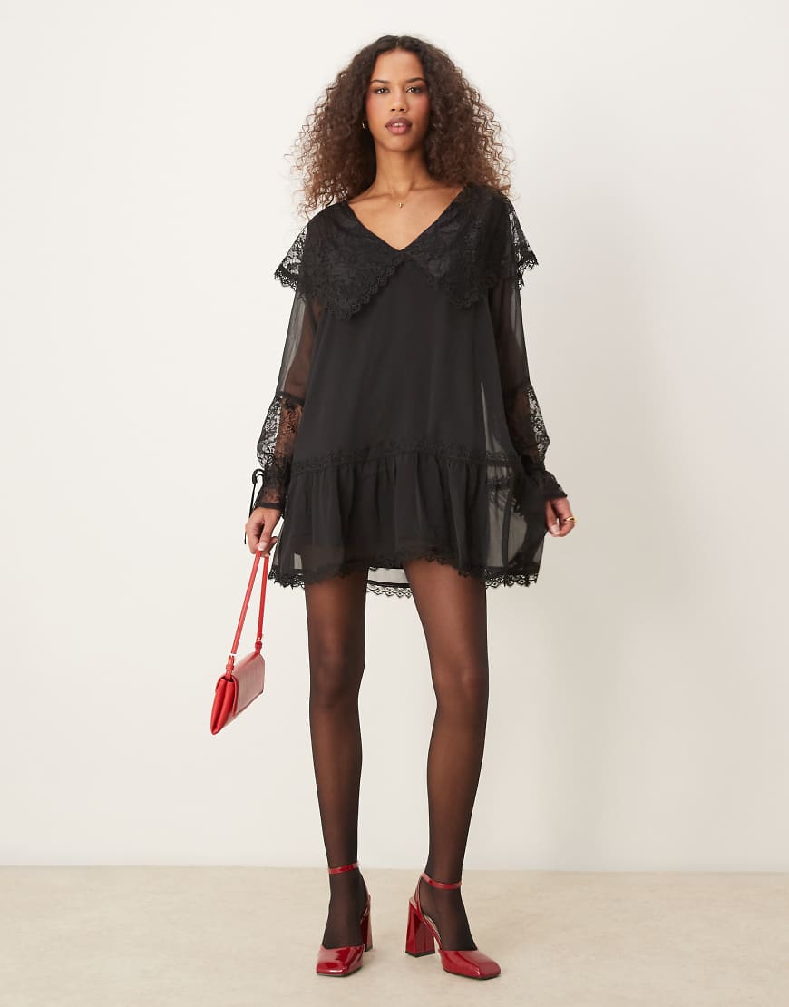 Miss Selfridge - Schwarzes Hänger-Minikleid mit Spitzenkragen Miss Selfridge - Schwarzes Hänger-Minikleid mit Spitzenkragen von Miss Selfridge