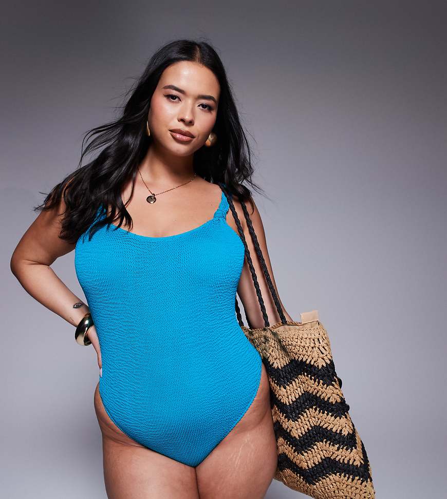 Moda Minx Curve - Badeanzug in Petrol mit Knitterstruktur und Zierknoten-Blau Moda Minx Curve - Badeanzug in Petrol mit Knitterstruktur und Zierknoten-Blau von Moda Minx Curve