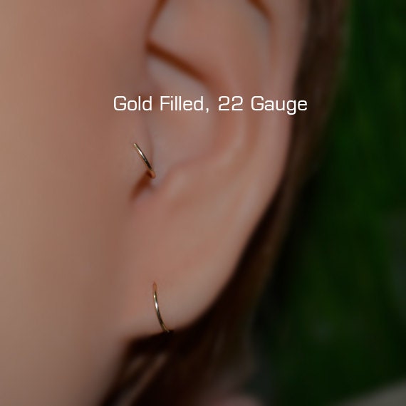Tragus-Ohrring 7 Mm - Gold-Nasenring Rook-Ohrring Knorpel-Reifen Vorwärtshelix-Ohrring Septum-Ring Tragus-Piercing 22 Gauge Tragus-Ohrring 7 Mm - Gold-Nasenring Rook-Ohrring Knorpel-Reifen Vorwärtshelix-Ohrring Septum-Ring Tragus-Piercing 22 Gauge von ModernJewelBoutique