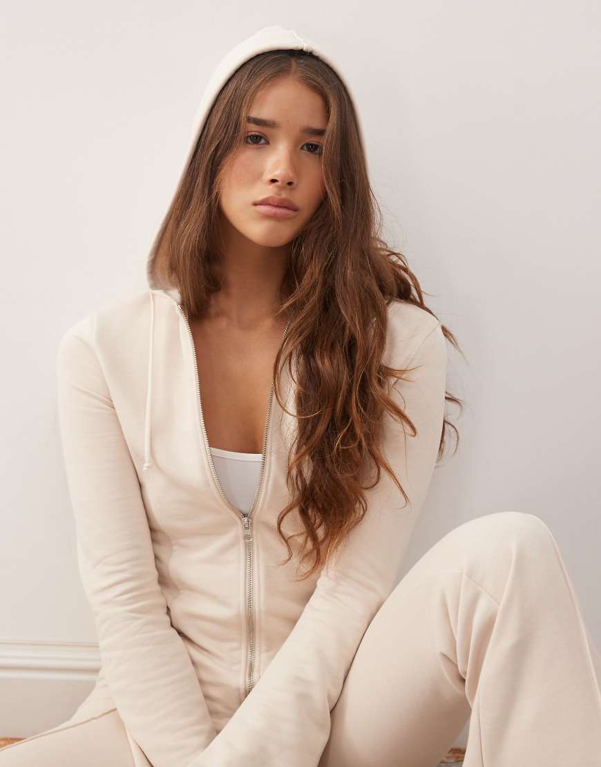 Monki - Figurbetonter Kapuzenpullover in Beige mit ausgestellten Ärmeln, Kombiteil-Neutral Monki - Figurbetonter Kapuzenpullover in Beige mit ausgestellten Ärmeln, Kombiteil-Neutral von Monki