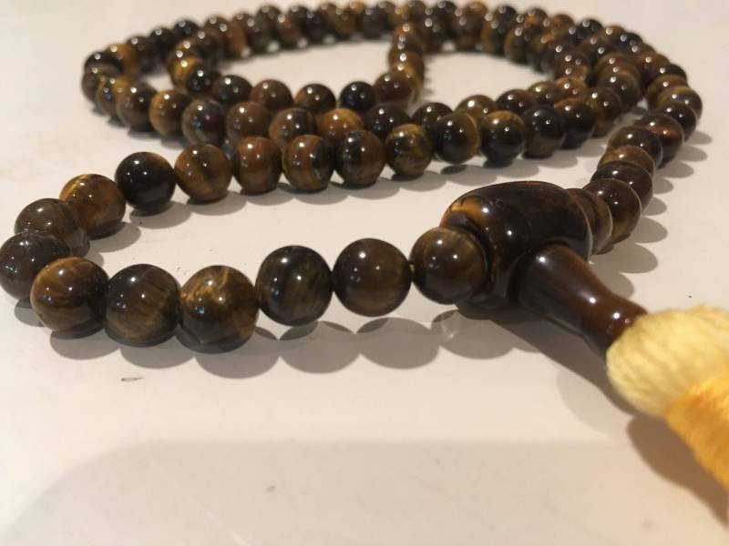 Tigerauge 108 Perlen Mala Halskette Mit Baumwoll Quaste Tigerauge 108 Perlen Mala Halskette Mit Baumwoll Quaste von MonksJoy