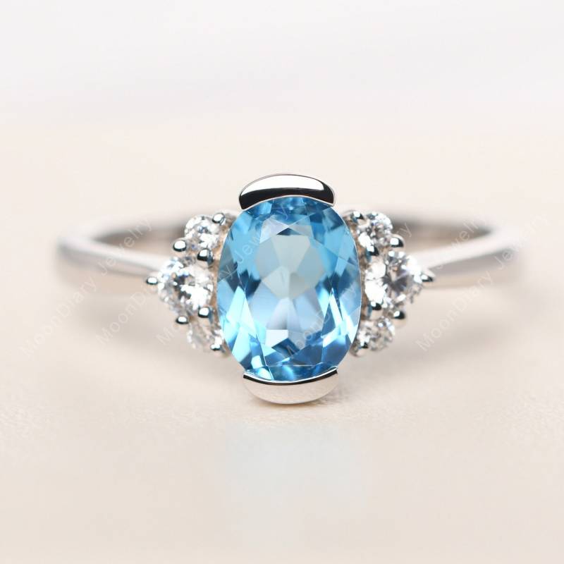 Echter Schweizer Blautopas-Brautring Ovalschliff Silber Halbe Lünette Gesetzt November Geburtsstein Ring von MoonDiaryJewelry
