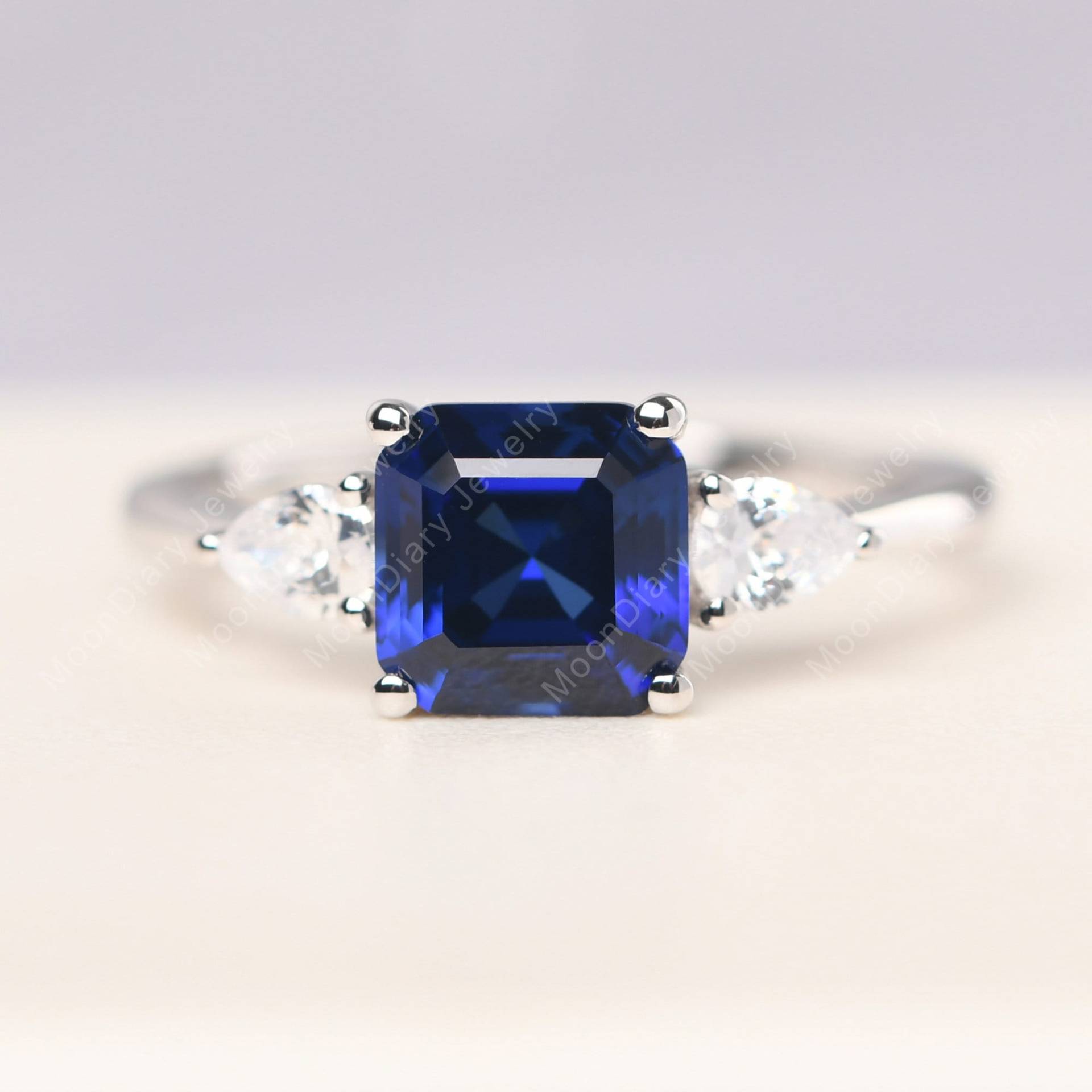 September Geburtssteinring Asscher Schnitt Saphir Verlobungsring Mit Birnen Seitensteine September Geburtssteinring Asscher Schnitt Saphir Verlobungsring Mit Birnen Seitensteine von MoonDiaryJewelry
