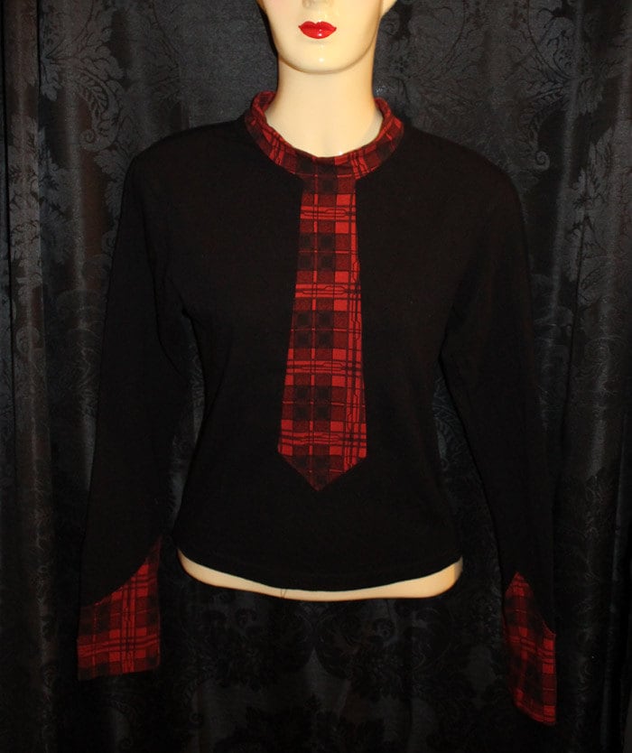 Cyberdog Schwarz Langarm Top Mit Roten Verzierungen Cyberdog Schwarz Langarm Top Mit Roten Verzierungen von Mosquitha