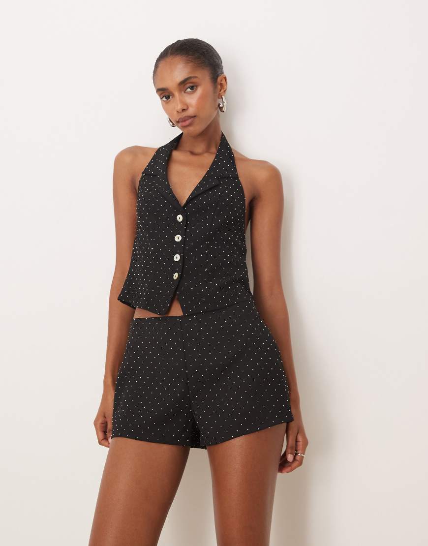 Motel - Mikanu - Weste in Schwarz mit V-Ausschnitt, Knopfleiste und Schmucksteinen, Kombiteil von Motel