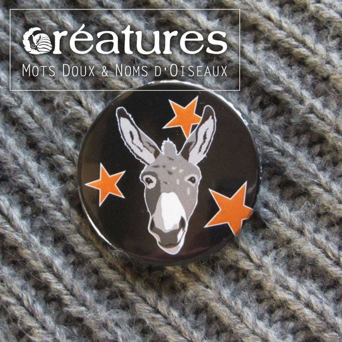 Abzeichen „Grauer Esel Mit Sternen" von MotsDouxNomsdOiseaux