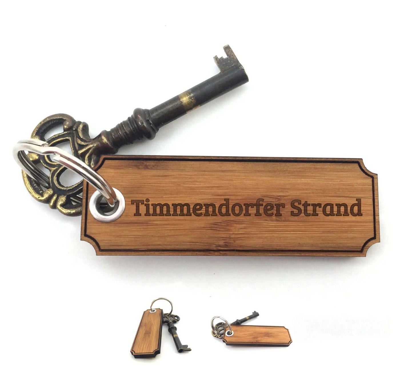 Mr. & Mrs. Panda Schlüsselanhänger Timmendorfer Strand - Bambus - Geschenk, Schlüsselanhänger, Geschenke (Packung, 1-tlg., Schlüsselanhänger Classic Gravur), Individuelles Design von Mr. & Mrs. Panda