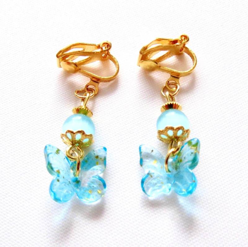 Kinder-Ohrclips Mit Blauen Glas-Schmetterlingen Und Cateya Perlen Ohrschmuck Kinderschmuck Ab 3 Jahren Unisex Geschenkidee Mitbringsel von MsSchmuck