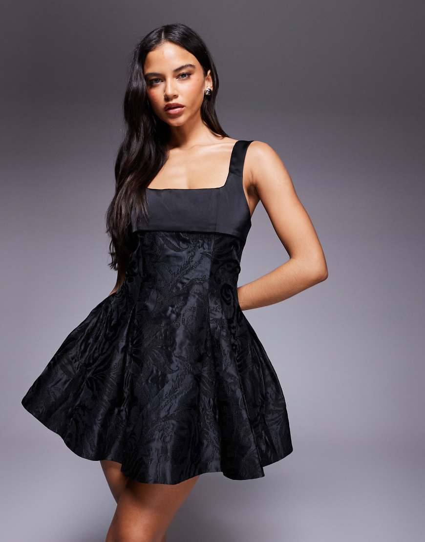 Murci - Minikleid aus Satin-Jacquard in Schwarz mit eckigem Ausschnitt und Rückenschleife von Murci