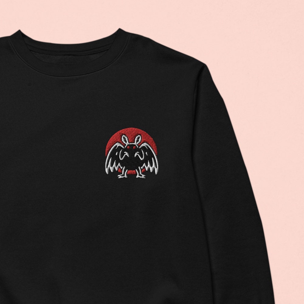 Mothman Cryptid Besticktes Sweatshirt von MurderApparel